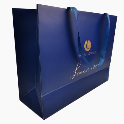 China Cheapest Customized Recyclable Blue Tissue Recyclable Gift Packaging Paper Bags for sale