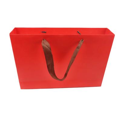 China Cheapest Recyclable Customized Recyclable Thick Paper Packaging Shopping Bags With Logo for sale