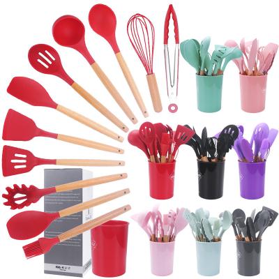 China Universal Viable Kitchen Accessories Cooking Tools Silicone Non-Stick Durable Silicone Kitchen Accessories With Wooden Han Utensil for sale