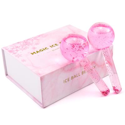 China Pore ​​Shrinking Custom PINK Color Glass Ice Ball Massage Products Face Ice Globes For Plastic Surgery Facial Wave Massage Ball for sale