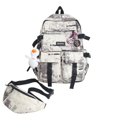 China Anti-theft Couples Graffiti Street Fashion Student Schoolbag Backpack Sling Purse Set Cool Backpack for sale