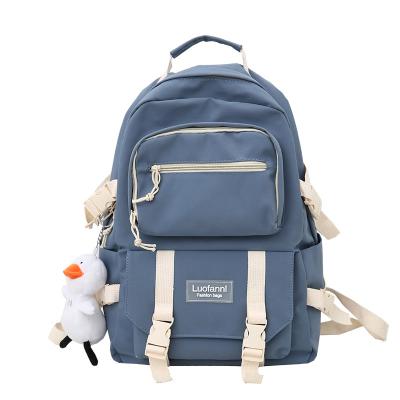 China Fashion Anti-theft 2021 Summer Canvas Large Capacity High School Student Schoolbag Outdoor Leisure Travel Men Bag Geometric Backpack for sale