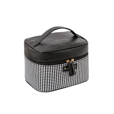 China Fashion New PU Houndstooth Portable Case Large Capacity Storage Box Tissue Travel Makeup Cosmetic Bag for sale