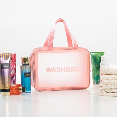 China Large PU Transparent Light Pink Makeup Travel Women Wash Fashion PVC Cosmetic Bag for sale