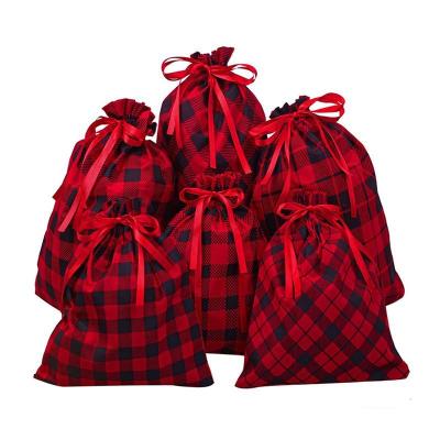 China Large Cotton Travel Christmas Hot Red Classic Plaid Gift Handled Canvas Drawstring Bag for sale