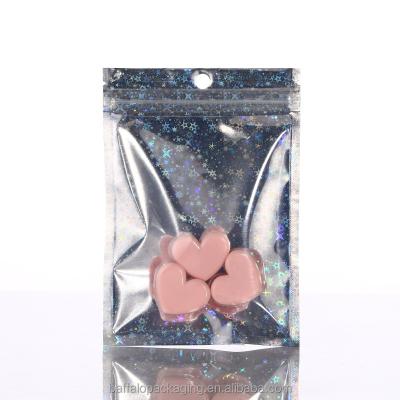 China Moisture Proof Holographic Bags With Hang Hole Holographic Packaging Bags Factory Wholesale Resealable Food Storage Mylar Bags for sale