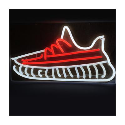 China Customs buildings lead the neon sign in the form of shoes for sale