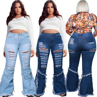 China 2023 breathable high waist wholesale ripped patchwork denim tears jeans loose flared oversized wide leg jeans woman for sale