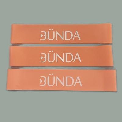 China Massage Women Love Customized Peach/Nude Color Yoga Latex Resistance Band For Gym Exercising 500mm for sale