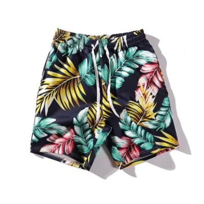 China Custom Men's Loose Sports Beach Flower Hawaiian Swimming Trunks Anti-UV for sale