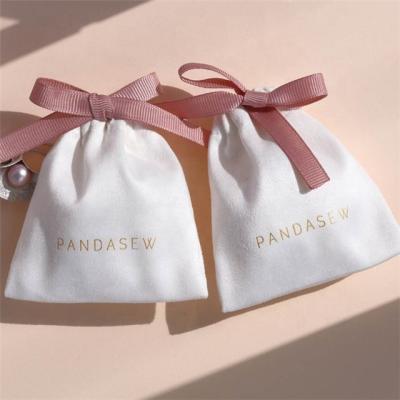 China Fashion Personalized Logo Print Velvet Drawstring Bags Flannel Jewelry Packaging Pouches for sale