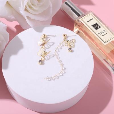 China The Other Sweet New Butterfly Ear Stud Crystal Earring Irregular Creative Personality Long Skirt Hollow Trinket Gift for Girlfriends for sale