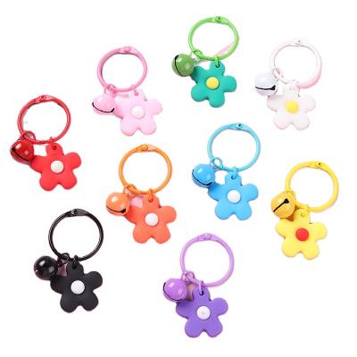 China Keys 2021 Fashion Trend Metal Key Chains Cute Flowers Black Pink Colorful Bell Designed Concise Key Ring For Girls Kids for sale