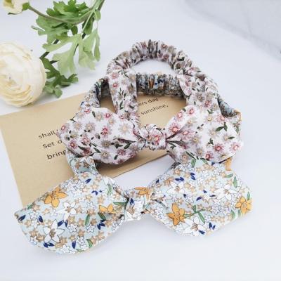 China Soft Turban Headband Bow Knot Print Fresh Flower Elastic Headband Women Hair Accessories for sale