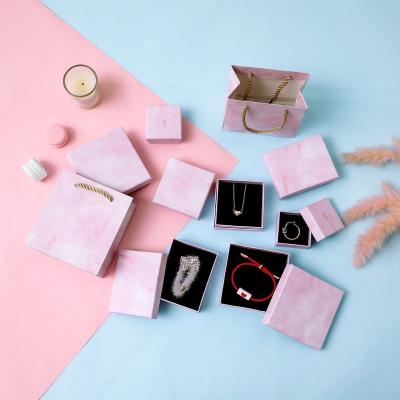 China Hot Selling Recycled Cardboard Materials Square Jewelry Box Organizer Bracelet Earrings Paper Jewelry Boxes for sale