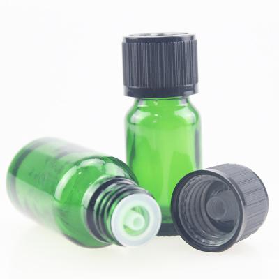 China Child Resistant 18mm Cosmetic Hot Plastic Screw Cap For Amber Green Blue Clear Essential Oil Round Glass Bottles for sale