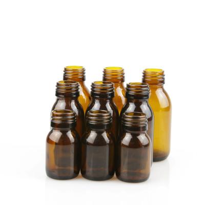 China Wholesale 30ml 60ml 100ml Cosmetic Amber Brown Round Boston Glass Oral Liquid Bottles With 28mm Screw Cap for sale