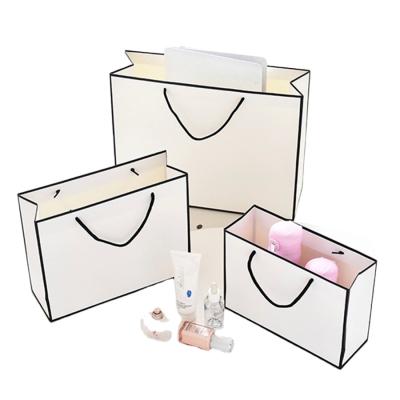 China Disposable Custom With Logo Luxury Gift Paper Bag Square Bottom for sale