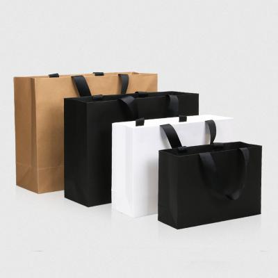 China Fashion Recyclable Paper Bag With Own You Logo Black Shopping Paper Bag for sale