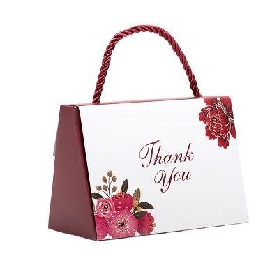 China Lovely Recyclable Rope Handle Paper Bag For Gift Candy Paper Bag for sale