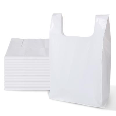 China Industrial Shopping HDPE T-Shirt Bag with Biodegradable Smiling Face and Heat Seal Handle for sale