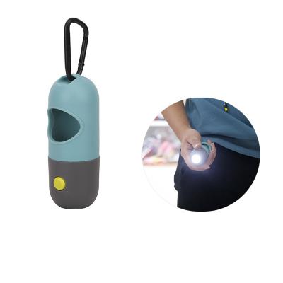 China Custom Ball Stocked Buckle Popular PE Material Shape LED Lighting Dog Pet Poop Bag Dispenser Collector for sale