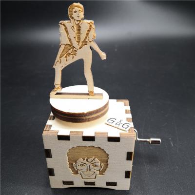 China Make Music Gift Michael Elvis Head Swivel Wooden Music Box for sale