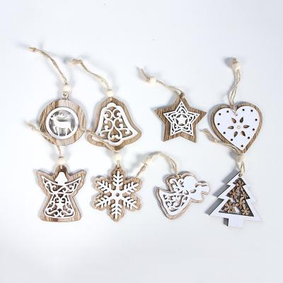 China Europe Christmas Pendant Hollow Christmas Tree Pendant 2 Creative Wooden Crafts for sale