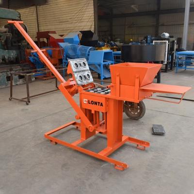 China qmr2-40 high pressure Manual Block Machine hydraulic paver kenya soil cement interlocking brick making for sale