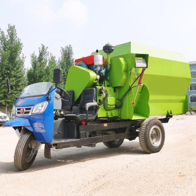 China Multifunctional Poultry Farm Cattle Farm Feeding Cart Crushing, Mixing and Grass Spreading Machine Integrated Livestock Equipment for sale