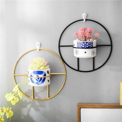 China Corrosion Resistance Home Decor Geometric White Ceramic Flower Wall Hanging Succulent Planter for sale