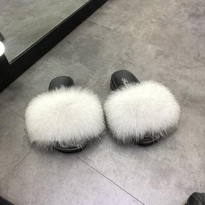 China Cushioning 2021 wholesale baby fox fur ball slides fluffy slippers for sale