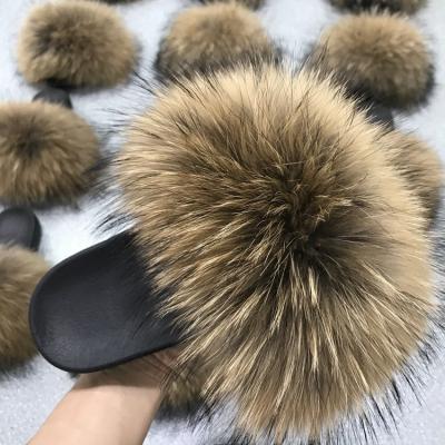 China Cushioning Summer 2021wholesale Big Toe Raccoon Fur Fashion Open Toe Slides Women Slippers for sale