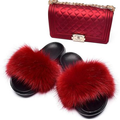 China Cushioning 2021 Custom Latest Fashionable Ladies Party Raccon Fur Jelly Purse and Fur Interior Slides Sets for sale