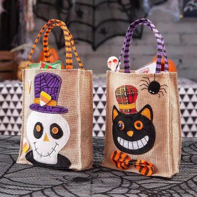 China 2022 Newest Jute Amazon Halloween Decor Candy Jute Shopping Tote Handbag Trick Treat Pumpkin Halloween Bag for sale