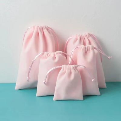 China Promotion 10*15cm Small Fabric Jewelry Pink Pockets Velvet Drawstring Storage Packaging Bag With Logo Printed Custom Made for sale