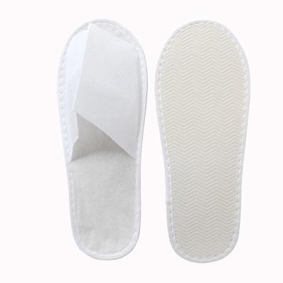 China Disposable Custom Soft Hotel Slipper White Travel Cotton Customized for sale