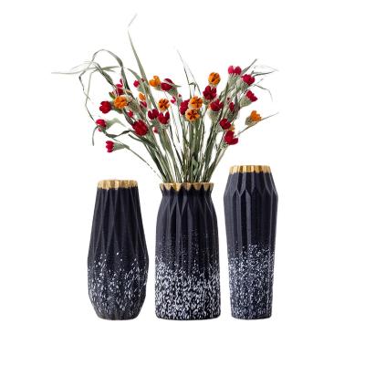 China Modern Creative Hydroponic Container Frosted Ceramic Vase Living Room Decoration Ins Flower Insert Black Gold Nordic Home Edge for sale