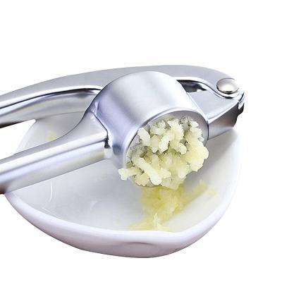 China Amazon Product Viable Kitchen Accessories Garlic Press Ginger Crusher Stainless Steel Garlic Press for sale