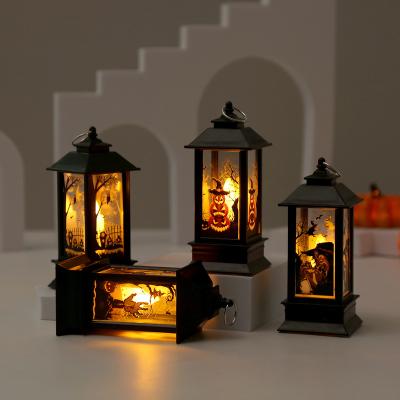 China Christmas Halloween Decorative Atmosphere Props Lamps Hand Held Candlestick Lighting Props LED Candle Lamps Pumpkin Electronic Wind L for sale