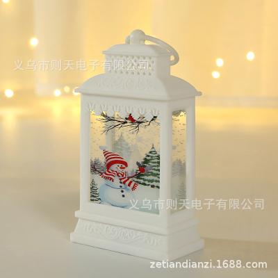 China Outdoor Decorative Hanging Ornaments Christmas Eve Box Wind Lantern Holiday Atmosphere Creative Glow Small Christmas Xmas Gift for sale