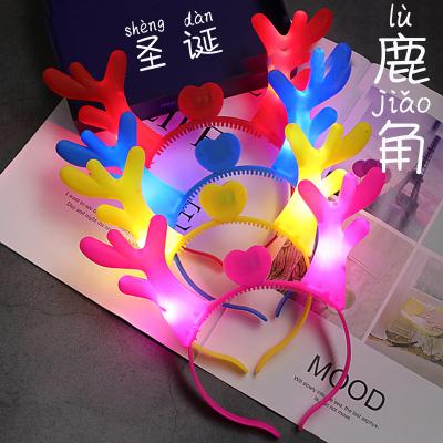 China Luxury Christmas Gift With Lamp Headwear Adult Led Headband Flash Concert Props Luminous Antler Headband Party Dressing Supplies for sale