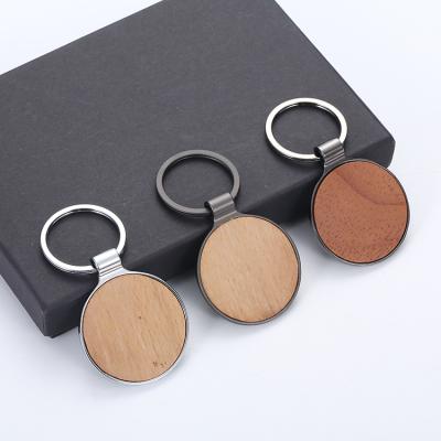 China Wooden Key Chain OEM Fashionable Creative Custom Logo The Log Metal Engraving Activity Key Chain for sale