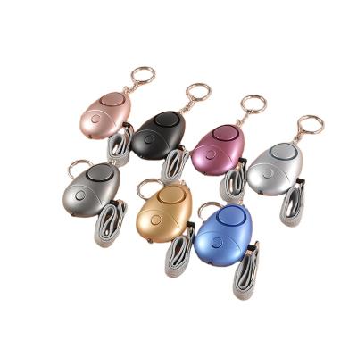 China Elderly Women Rechargeable Personal Self-defense Alarm Security Key Chain USB Emergency 130DB Multifunctional Colorful Led Key Chain for sale