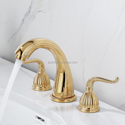 China X9569B Modern Luxury Brass Material Golden Colors And Artistic Basin Mixer Double Bronze Handle for sale