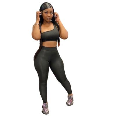 China New Summer Workable Solid Color Ladies Fitness Tracksuits Ladies Streetwear Set Sleeveless Sets One Shoulder Casual Two Piece Women for sale