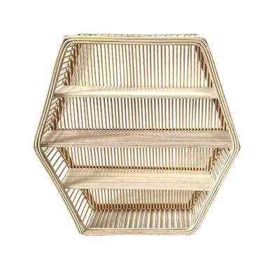 China K&B China Hexagon Handmade Rattan Wall Hanging Shelf Stocked Wicker Rack for sale