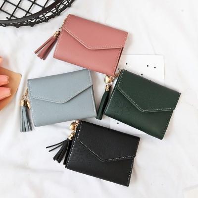 China Waterproof 2020 New Arrivals Tassels Simple Style PU Mini Wallet Coin Leather Clip Fashionable Small Purses for sale