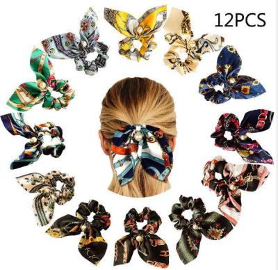 China Fabric Scrunchies Ties Band Printed Satin Pearl Bow Hair Tie for sale