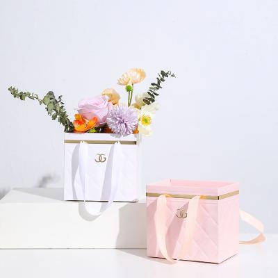 China Recycled Materials flowers paper packaging bag bouquet packaging handcase flower bouquet gift bag for sale